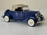 1935 Chevy Standard Roadster Navy Blue Die Cast 2DR Cloth Top Car. Fixed Price $22.50.